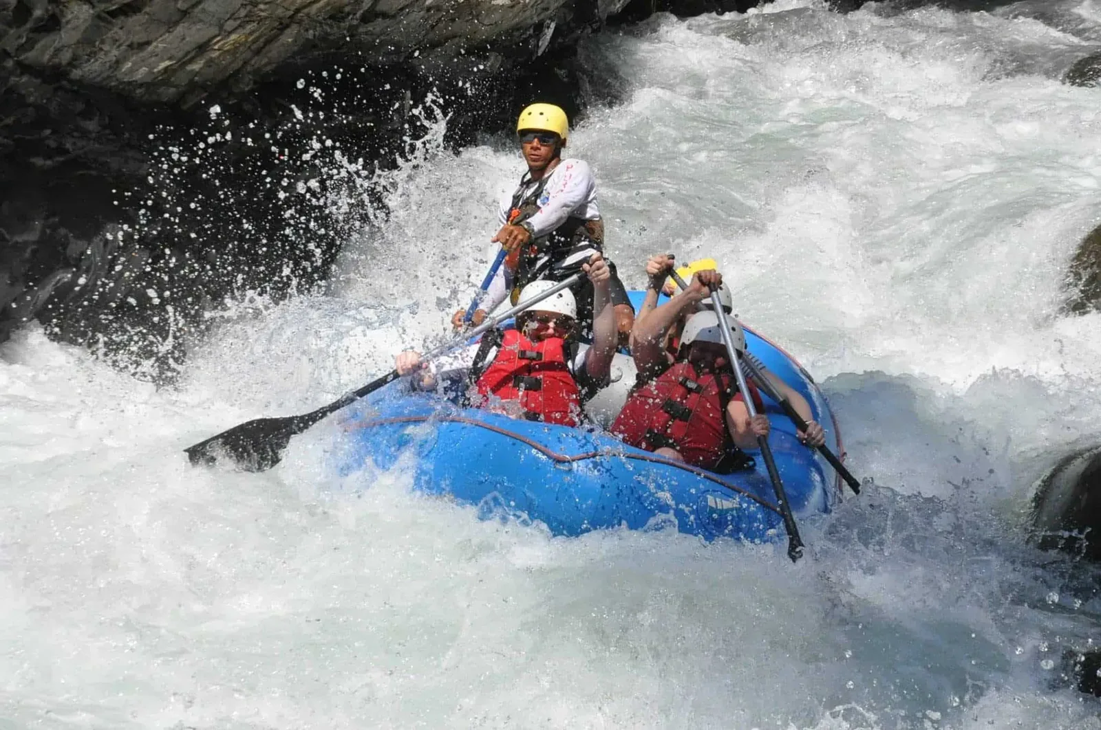 Guided raft running the steep drops of El Chorro near Manuel Antonio