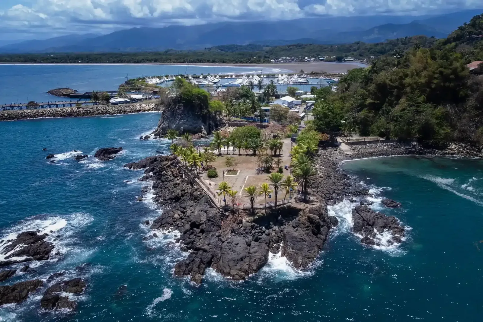 Paddlers exploring the Central Pacific coastline by kayak