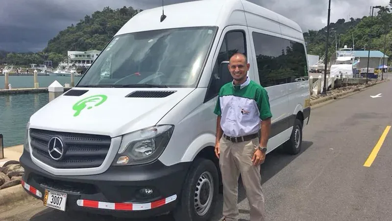 Air-conditioned Tucanes Tours microbus ready for an airport transfer
